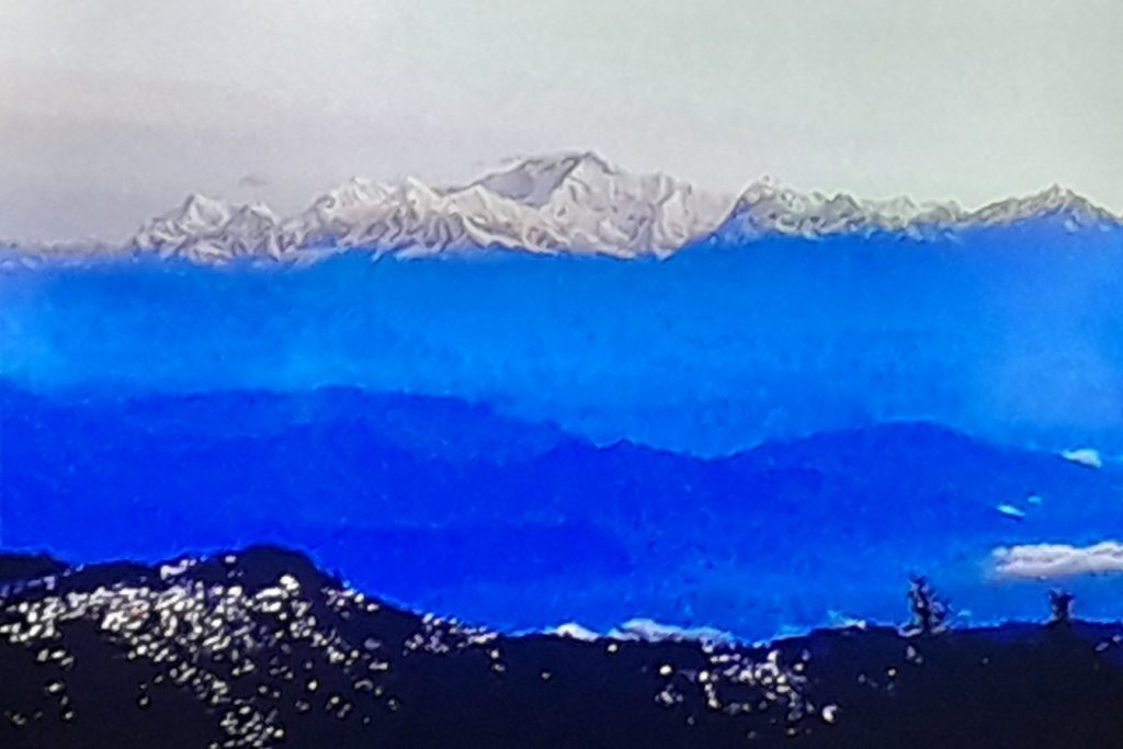 Snow-capped Kanchenjunga range seen from Tiger Hill before sunrise, Darjeeling