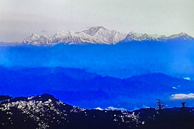 Snow-capped Kanchenjunga range seen from Tiger Hill before sunrise, Darjeeling